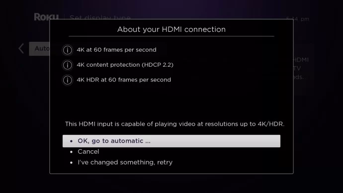 Select the ok go automatic option to adjust screen size on Roku TV
